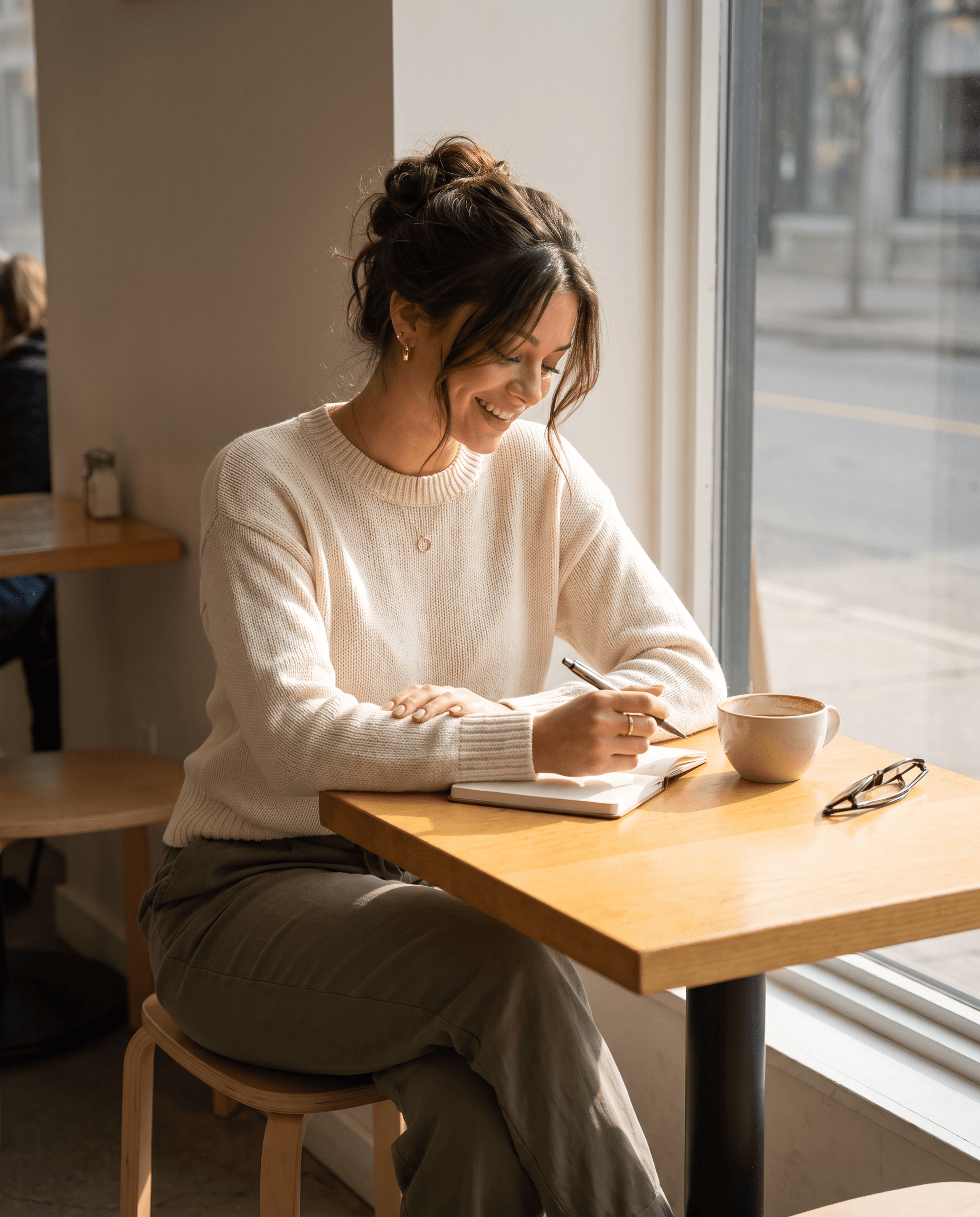 Editorial representation of Remy writing in a café on Sunday morning